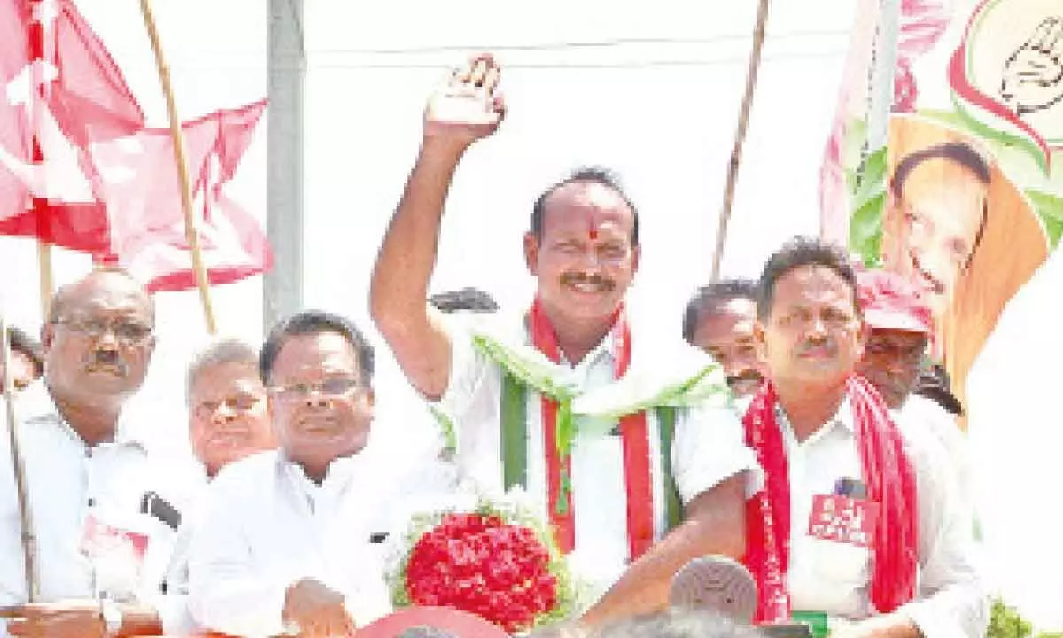 INDIA bloc candidate for Ongole parliamentary constituency Eda Sudhakar Reddy greeting people during the rally before nomination in Ongole on Thursday