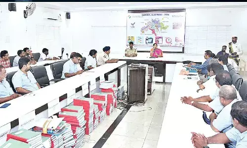Collector K Madhavi Latha and SP P Jagdeesh holding an emergency meeting with representatives of trade unions and management on Thursday