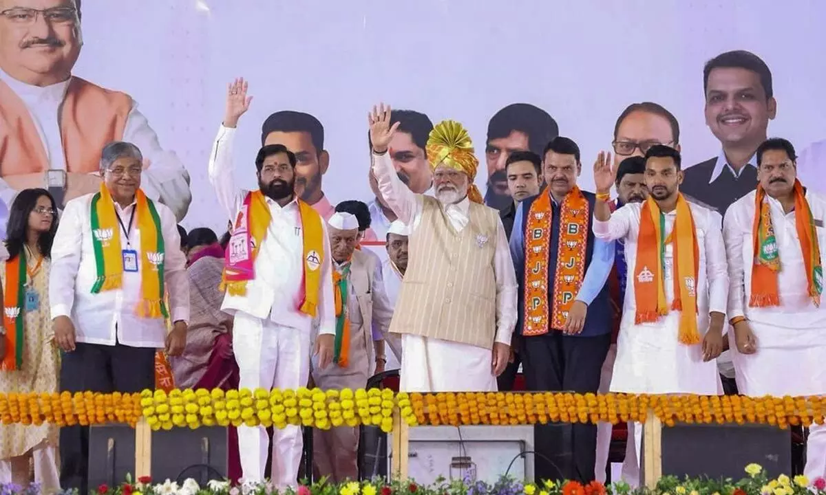 Prime Minister Narendra Modi with Maharashtra Chief Minister Eknath Shinde, Deputy Chief  Minister Devendra Fadnavis and others during an election rally in Kolhapur district on Saturday