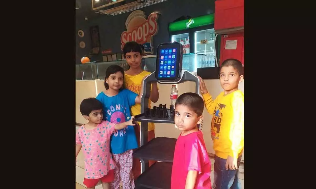 Vijayawada: Children drawn to Robot that serves food