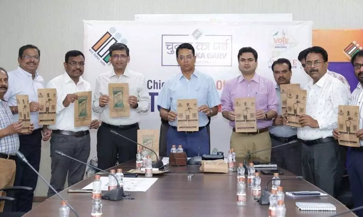 Chief Electoral Officer of Telangana Vikas Raj along with officials of Gemini Edibles and Fats India Limited taking part in a mission to bring voter awareness and sensitise eligible voters to cast their votes at an event held in the city on Monday.