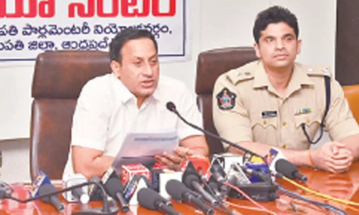 Collector and District Election Officer Pravin Kumar addressing the media in Tirupati on Monday. SP Krishna Kanth Patel is also seen