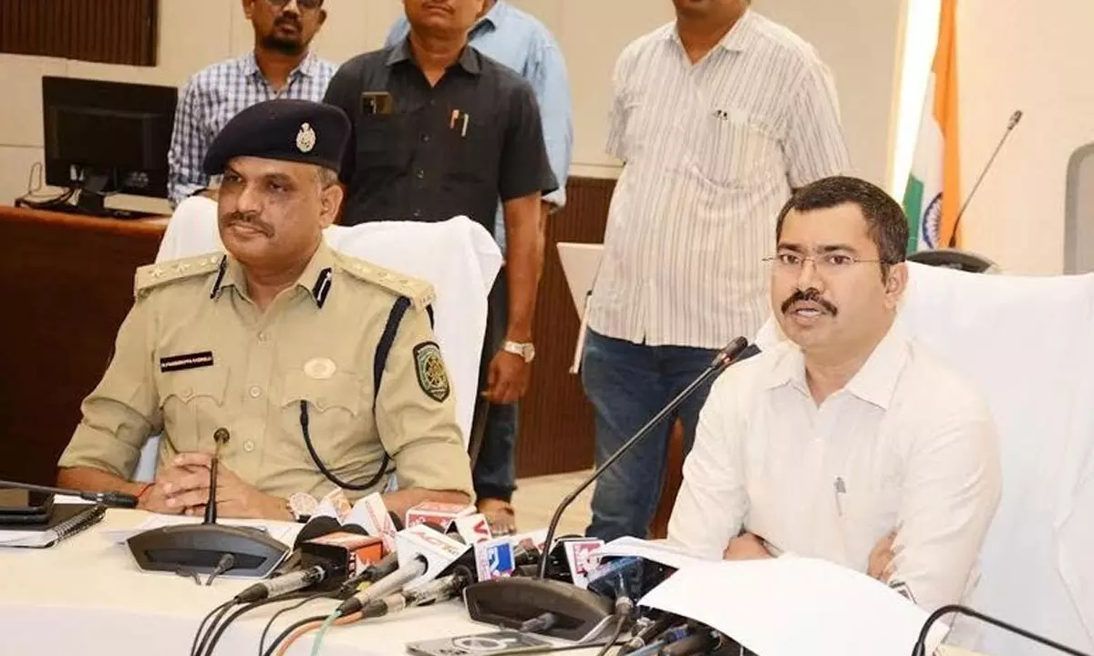 District Collector A Mallikarjuna and Joint Commissioner of Police K Fakeerappa at the media conference held in Visakhapatnam on Tuesday