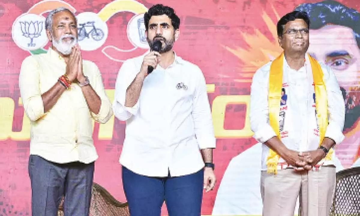 TDP national general secretary Nara Lokesh addressing ‘Hello Lokesh’ programme in Chandragiri on Thursday. Chandragiri TDP MLA and MP candidates Pulivarthi Nani and D Prasada Rao are also seen.