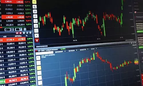 Premium valuation discomfort triggers profit booking