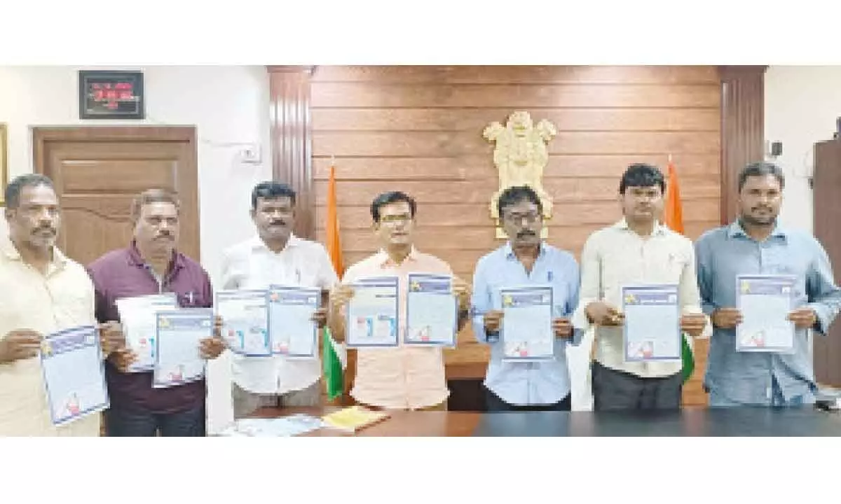 Prakasam district collector AS Dinesh Kumar releasing poster and pamphlets creating awareness on voting and legal  provisions to SCs and STs, in Ongole on Sunday