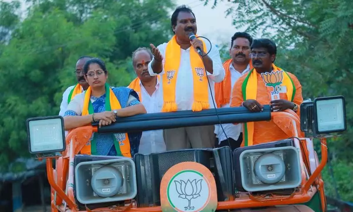 BJP Warangal Lok Sabha candidate Aroori Ramesh campaigning in Mogullapally mandal headquarters in Bhupalpally district on Sunday. BJP State official spokesperson Chandupatla Keerthi Reddy is also seen