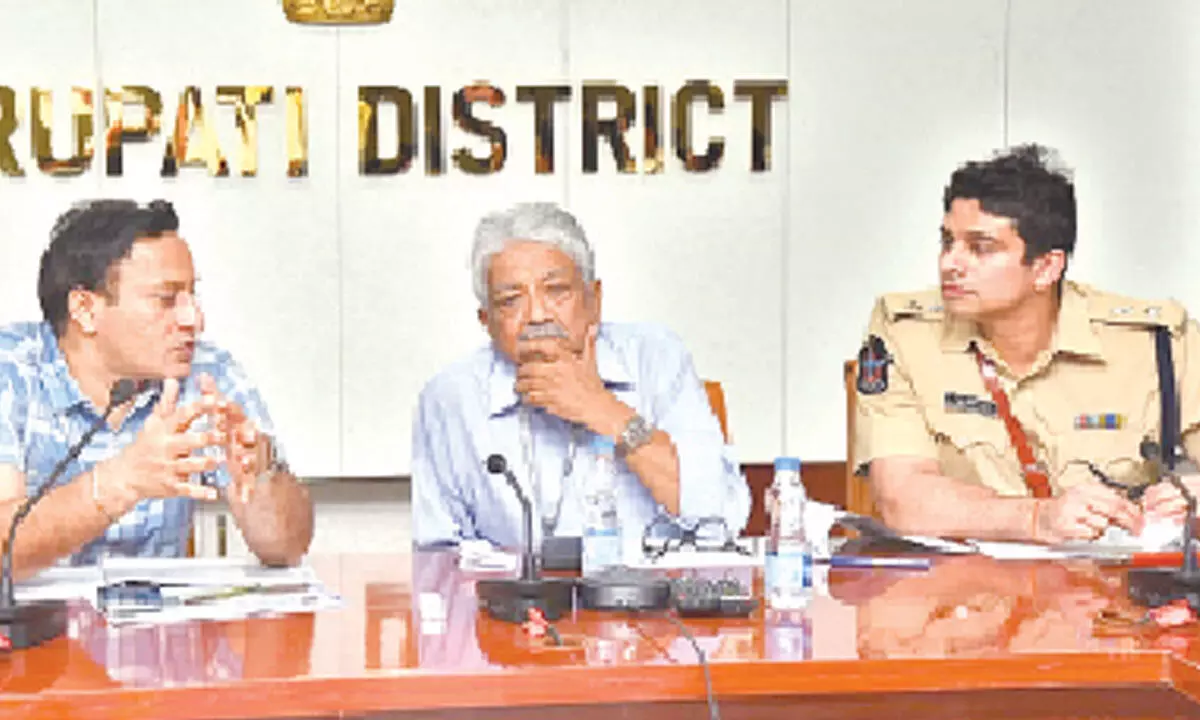 Special Police Observer Deepak Mishra with District Election Officer Pravin Kumar and SP Krishna Kanth Patel at a review meeting at Tirupati Collectorate on Monday
