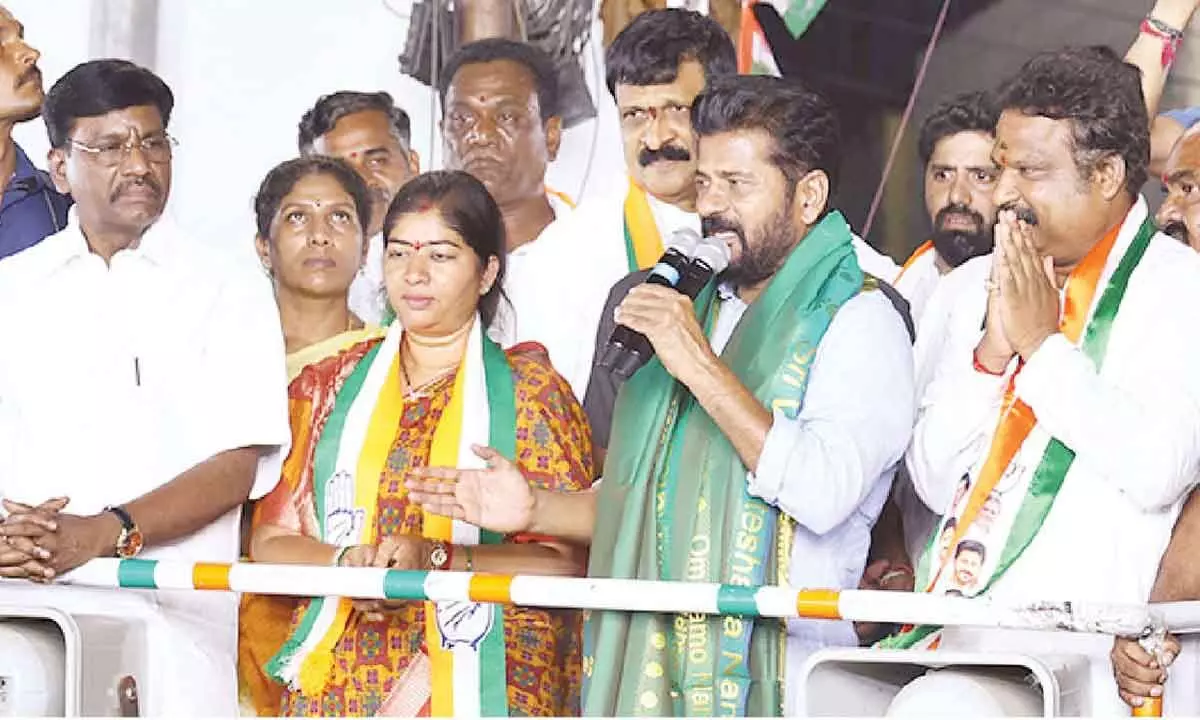 Malkajgiri Congress candidate Patnam Sunitha Mahender Reddy along with Chief Minister A Revanth Reddy taking part in a road corner meeting at Uppal in the city on Monday
