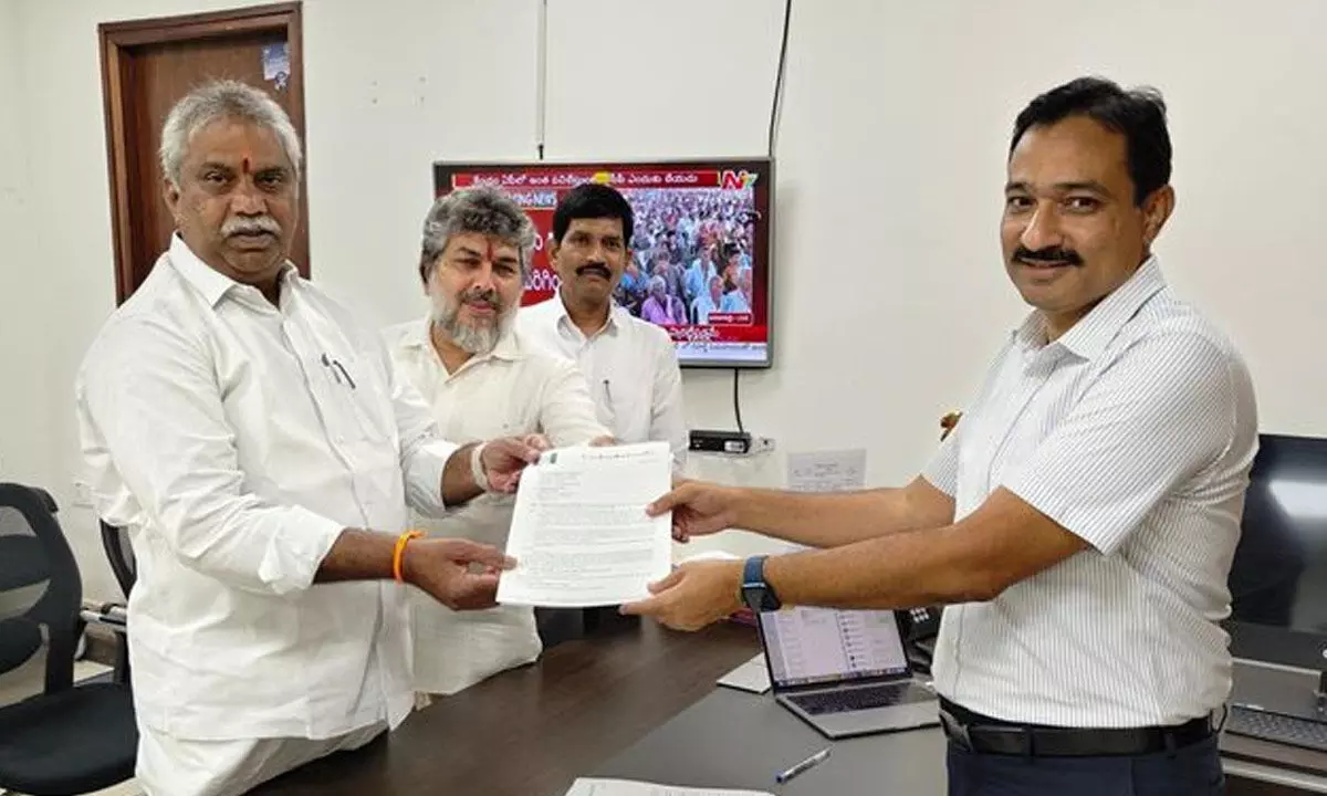 YSRCP MLA Malladi Vishnu and party grievances cell chairman A N Narayana Murty submitting a complaint against TDP chief N Chandrababu Naidu to Chief Electoral Officer M K Meena at the Secretariat on Tuesday