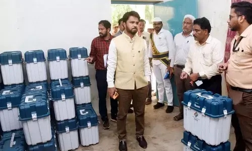 Collector V Prasanna Venkatesh inspecting commissioning of EVMs in Eluru on Monday