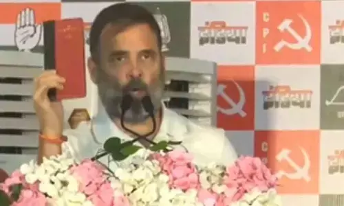 Rahul waves copy of Constitution at Jharkhand rally, says ‘ready to sacrifice life to protect it’