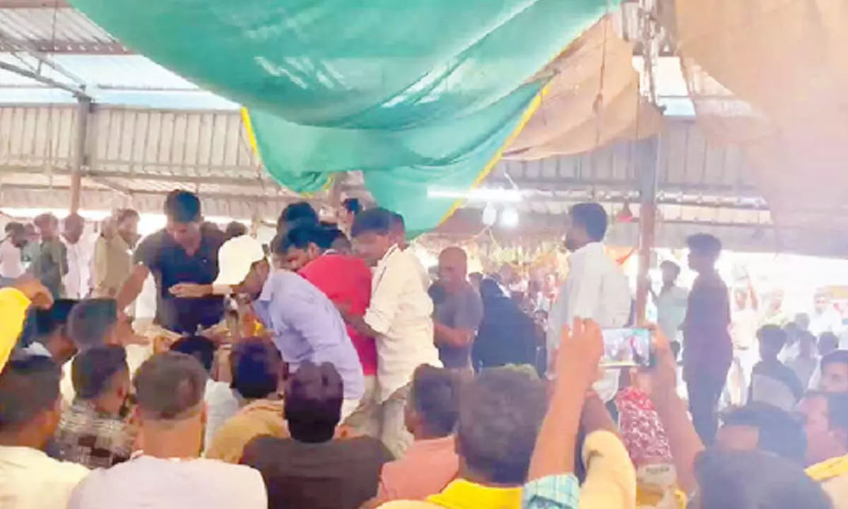 YSRCP and TDP supporters engage in a clash at agriculture market in Banaganapalli town on Tuesday