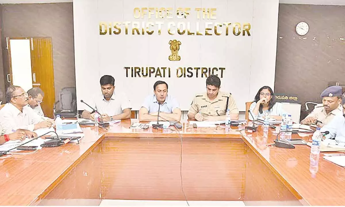 Collector and DEO Pravin Kumar speaking at a review meeting in Tirupati on Thursday. SP Krishna Kanth Patel, Joint Collector HM Dhyana Chandra and Commissioner Adithi Singh are also seen.
