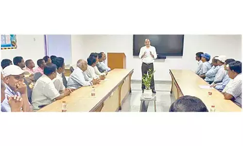 Apitoria Pharma HR vice-president U N B Raju interacting with workers in a meeting on Thursday