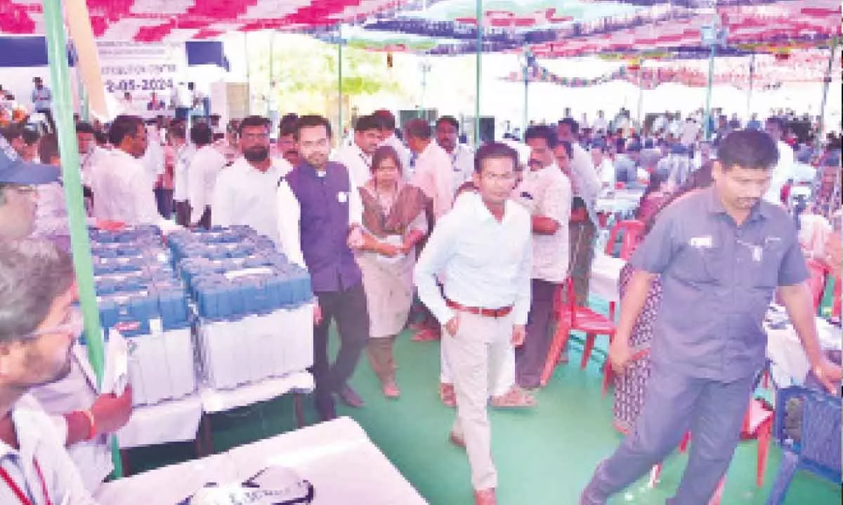 Prakasam district collector and election officer AS Dinesh Kumar inspecting polling material distribution at Markapuram on Sunday