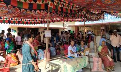 Long queue line at a booth in Srikalahasti town Long queue line at a booth in Srikalahasti town