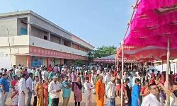 People waiting to exercise their right to vote at the polling centre in High School, Pernamitta of Ongole assembly