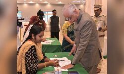 Governor S Abdul Nazeer exercising his franchise in Vijayawada