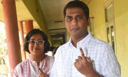 Chittoor District Collector M. Harinarayanan along with his wife exercised their franchise at DKW College in the city on Monday. Chittoor District Collector M. Harinarayanan along with his wife exercised their franchise at DKW College in the city on Monday.