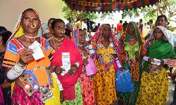 Vijayawada: Tribal women with voter ID cards in a polling centre in A Konduru mandal of NTR district.