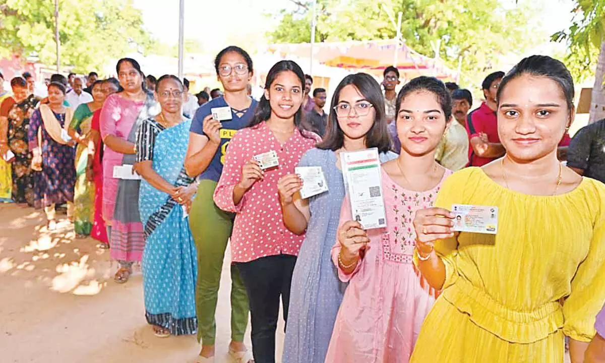 First time women voters wating in queue for their turn at Ramaiah School at Mulapet in Nellore city on Monday