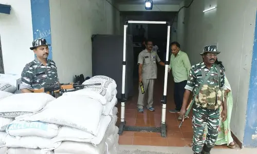 CRPF personnel stand guard at the strong rooms setup at Nimra College in Ibrahimpatnam on Tuesday  Photo: Ch Venkata Mastan