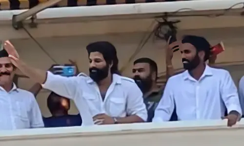 Allu Arjun waves to fans along with YSRCP nomnee during his  visit to Nandyal on May 11