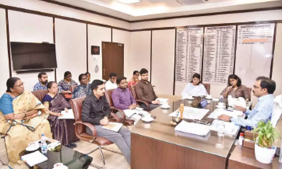 Collector M Venugoopal Reddy holding a meeting with officials in Guntur on Thursday