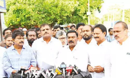 Minister Botcha Satyanarayana and other members of YSRCP delegation addressing the media after meeting Governor S A Nazeer at Raj Bhavan in Vijayawada on Thursday