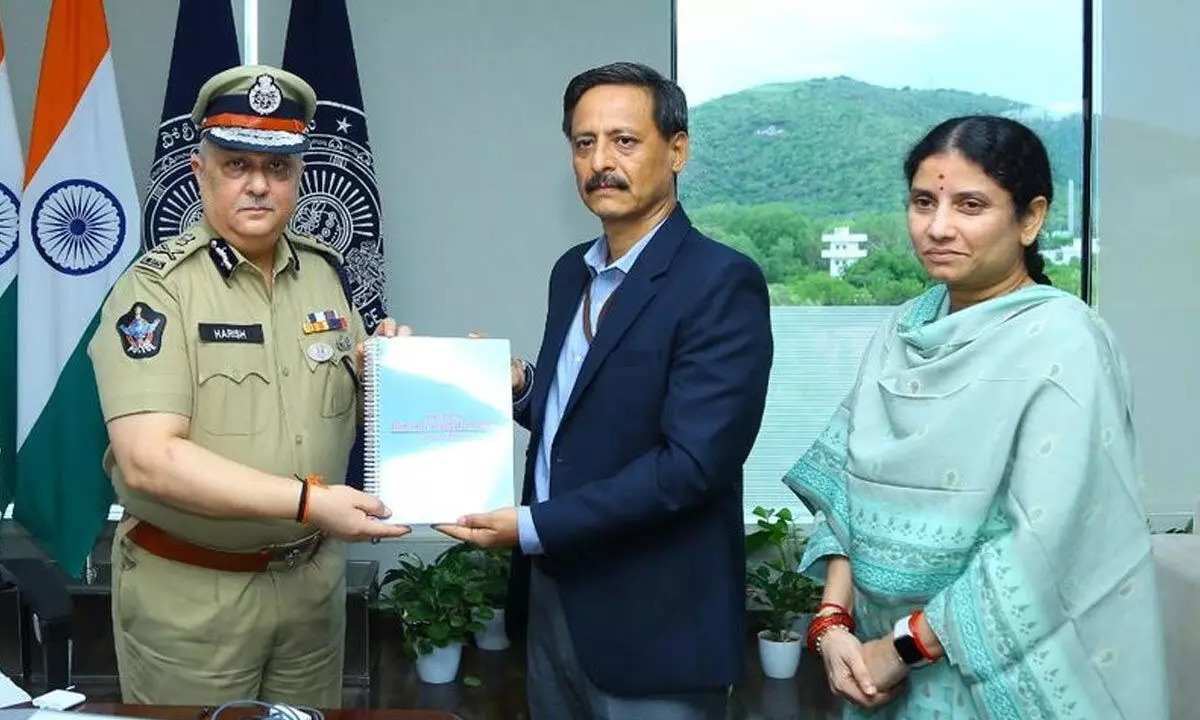Head of SIT and SEB IG Vineet Brijlal submitting SIT report to DGP  Harish Kumar Gupta at the State police office in Mangalagiri on Monday