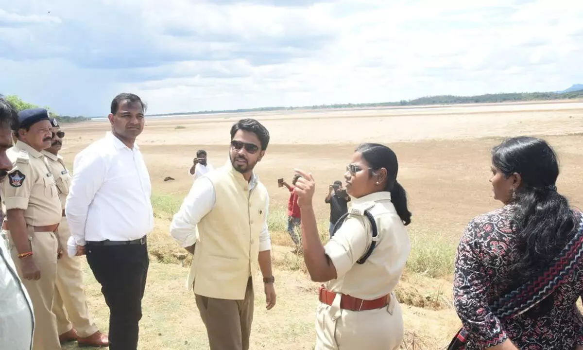 Collector V Prasanna Venkatesh inspecting sand reaches in Eluru district on Monday