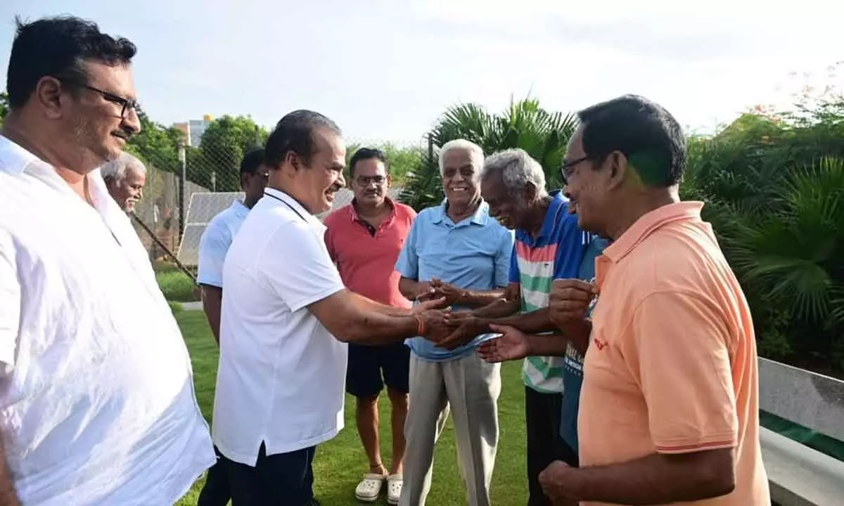 TDP leader Jangalapalli Srinivasulu interacting with morning walkers at Sri Babu Jagjivanram Park in Tirupati on Thursday