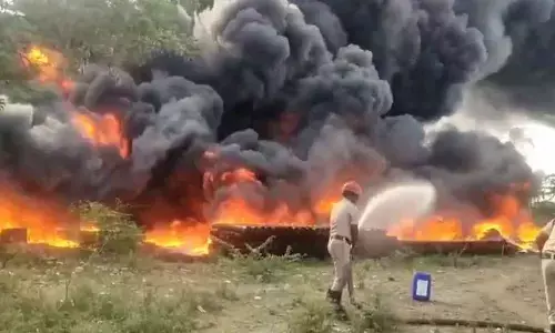 Fire department staff at work at fire accident site in Guntur on Thursday
