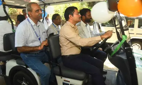 District collector A Mallikarjuna driving a battery-operated car donated by RINL to KGH in Visakhapatnam on Thursday