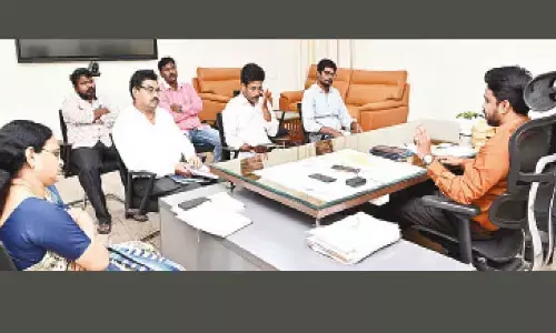 Collector V Prasanna Venkatesh holding a meeting with representatives of political parties in Eluru on Thursday
