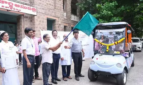 An eight-seater battery-operated transport car being flagged off at King George Hospital in Visakhapatnam