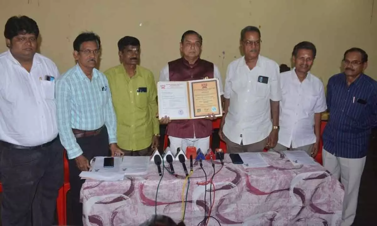 Godavari Conservation Samiti President TK Visweswara Reddy (Centre) who received an honorary doctorate from the British National University