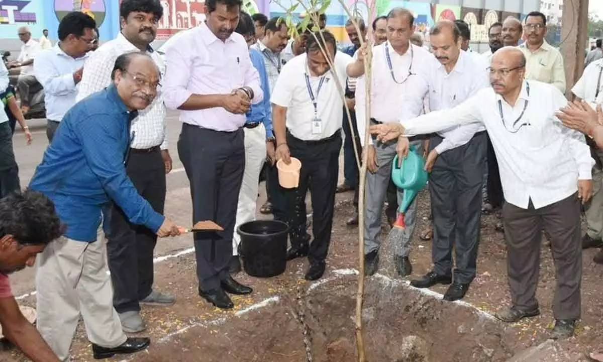 VPA officials taking part in the tree plantation drive in Visakhapatnam on Thursday