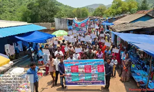 Tribals taking out rally in G Madugula mandal of Alluri Sitarama Raju district on Thursday