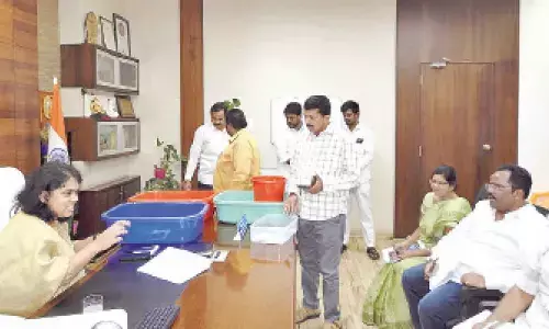 GMC Commissioner and Guntur East Assembly constituency returning officer Kirthi Chekuri addressing review meeting at her chamber on Thursday