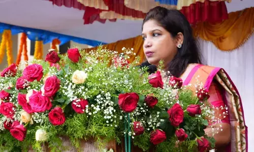 Grand State Inauguration Day Celebrations Collector Dr. Priyanka Ala who unveiled the National Flag