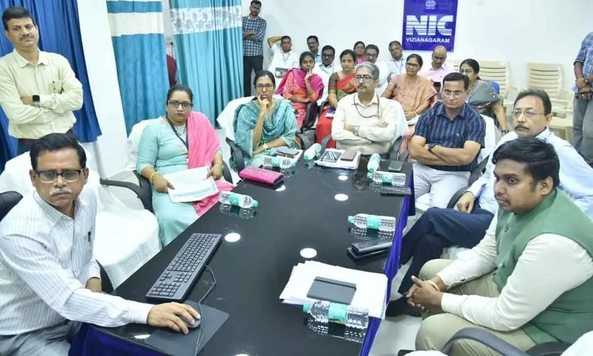 Vizianagaram Collector S Nagalakshmi and other officials taking part in a video-conference held by Chief Electoral Officer Mukesh Kumar Meena on Sunday