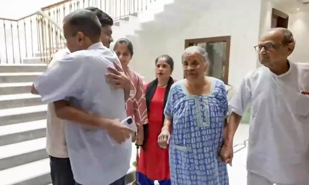 CM hugs children, touches parents’ feet before surrender