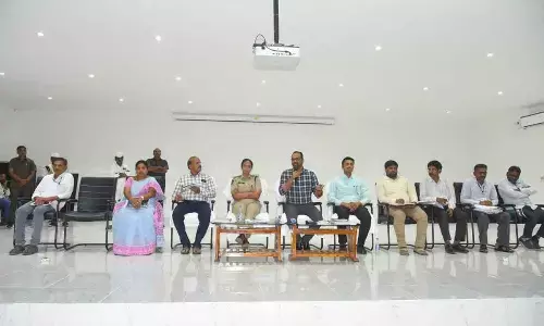 Palnadu district Collector Srikesh B Lathkar addressing a meeting in Narasaraopet on Sunday. SP Malika Garg is also seen