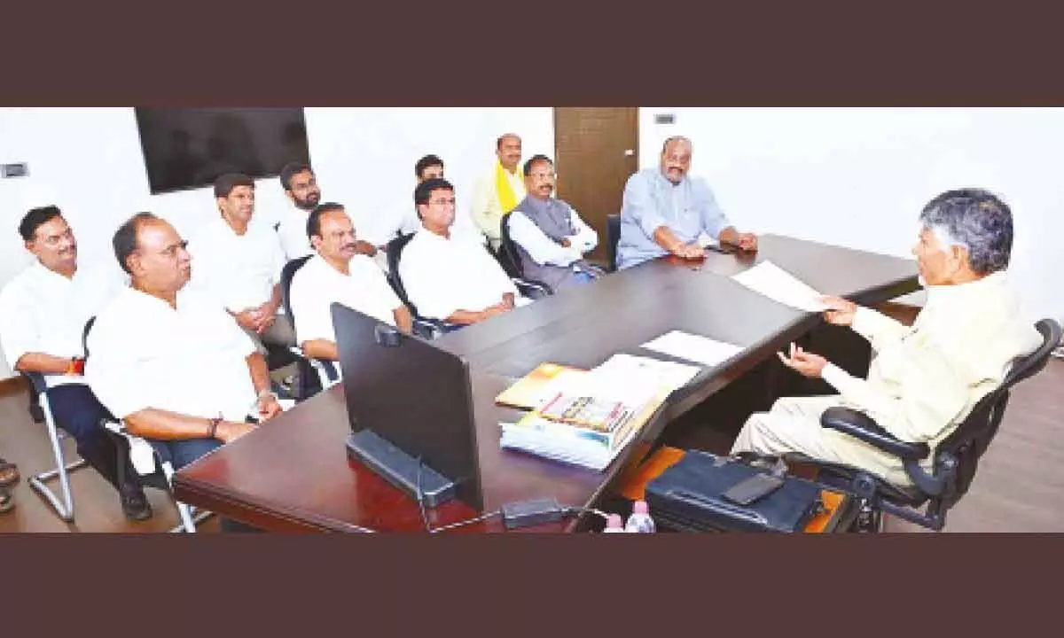 TDP national president N Chandrababu Naidu along with state president KinjarapuAtchannaiduholds a meeting with available party MPs at his residence in Undavalli near Vijayawada on Thursday