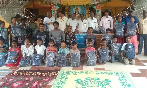 Distribution of school bag kit to orphan children