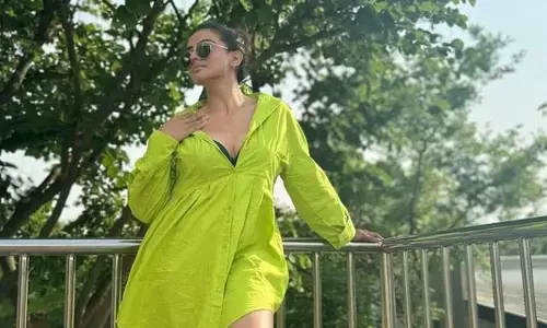 Akshara Singh shells cool girl vibes in green shirt dress, sneakers & sunglasses