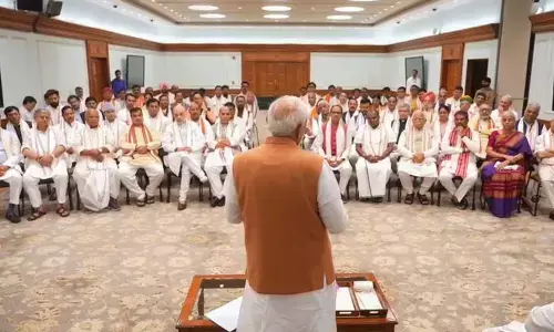 Prime Minister-designate Narendra Modi with NDA leaders during an interaction over tea, in New Delhi on Sunday