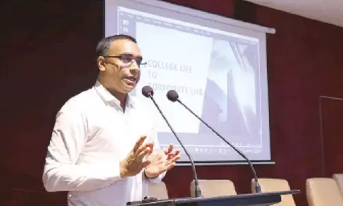 Senior director of ADP India K Hemchandra addressing the students of PB Siddhartha College of Arts and Science in Vijayawada on Saturday
